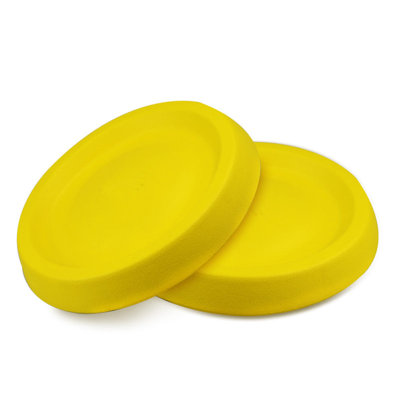 Plastic dog fetch toy displayed against a plain background