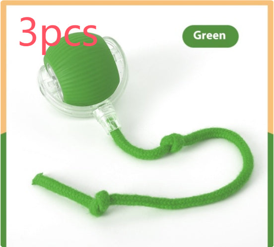 Automatic cat toy ball in green with attached string for interactive play and engagement.