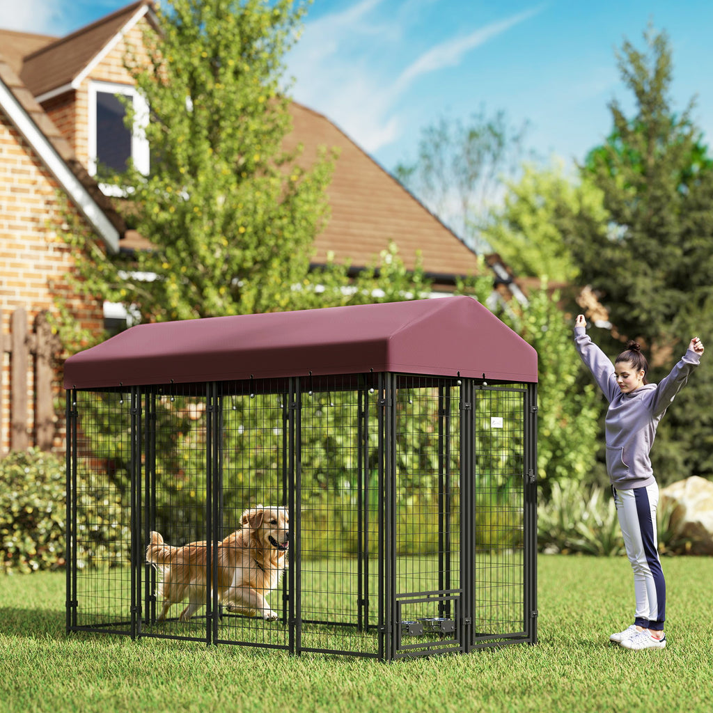 Outdoor dog kennel in red with walk-in access and covered enclosure