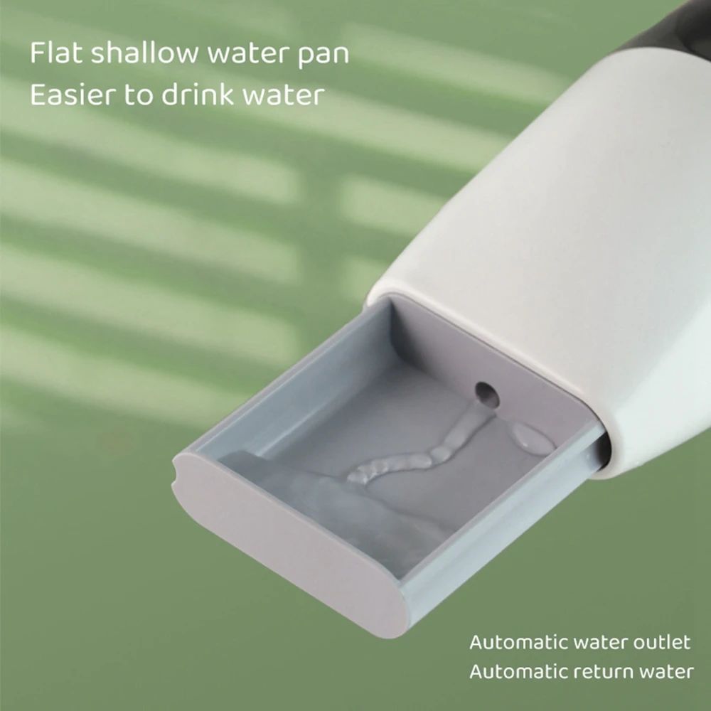 Portable dog water bottle with integrated pet drinking bowl