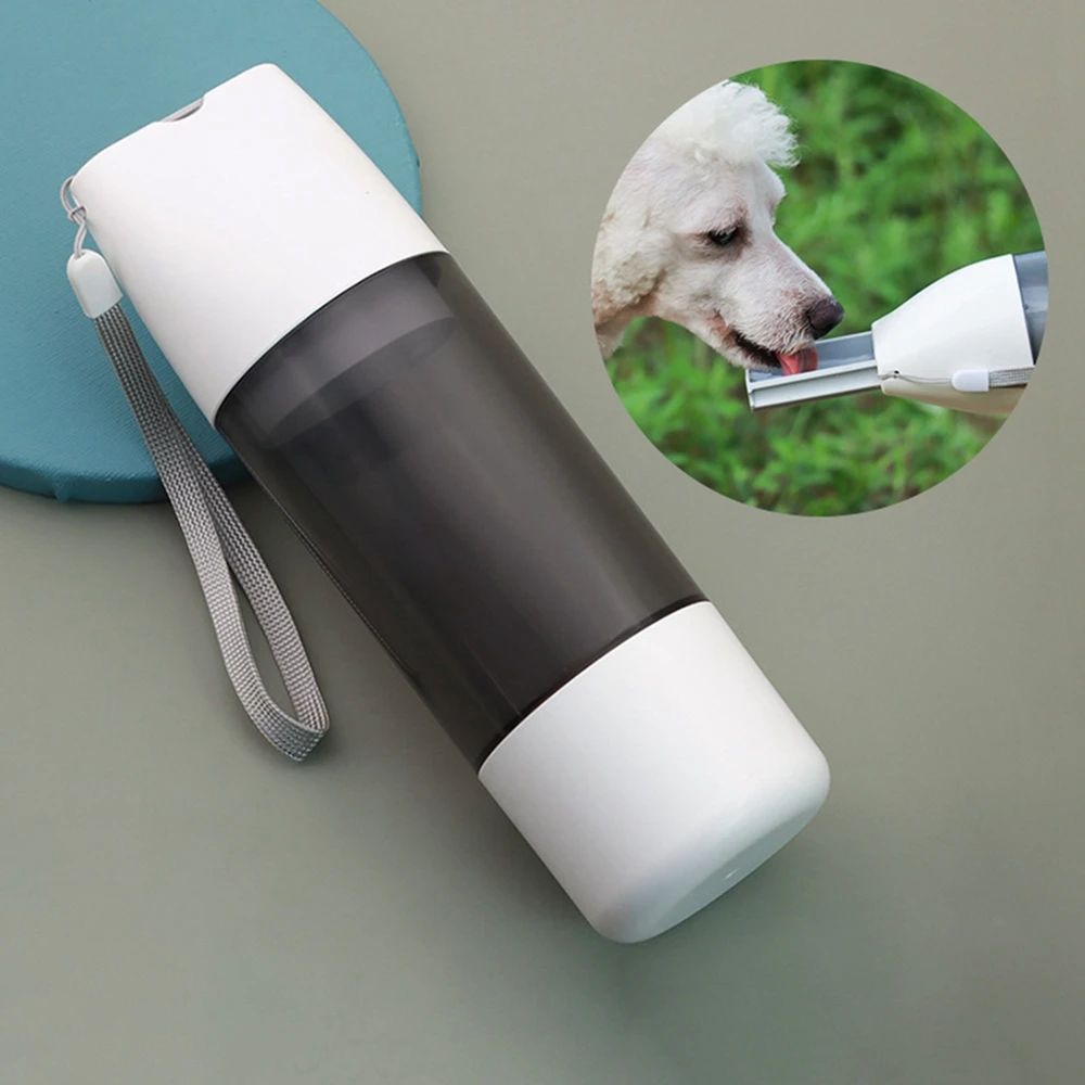 Portable dog water bottle with integrated pet drinking bowl