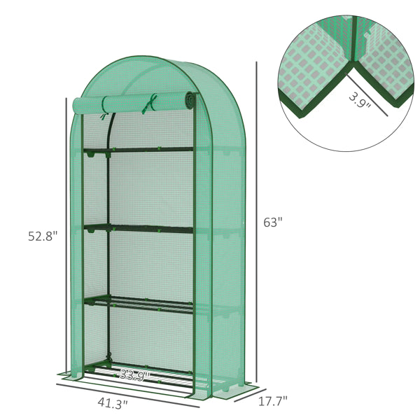 Walk-in greenhouse set up outdoors for growing potted plants