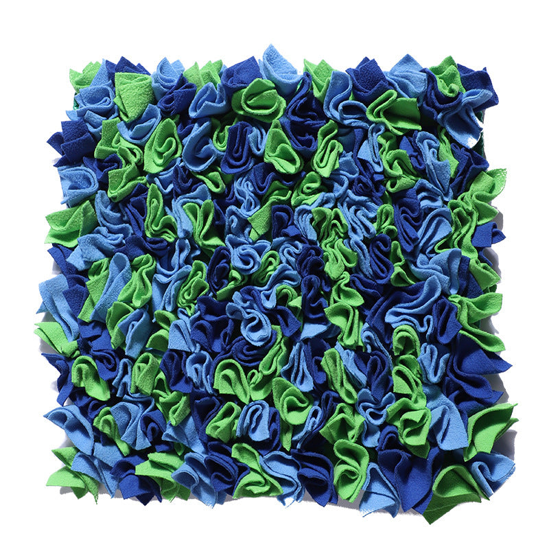 Dog snuffle mat with colorful fabric sections for treat hiding