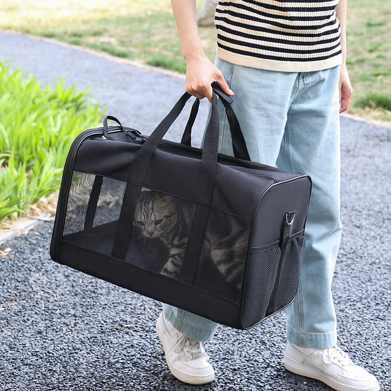 Portable pet carrier bag shown in its unfolded carrying shape